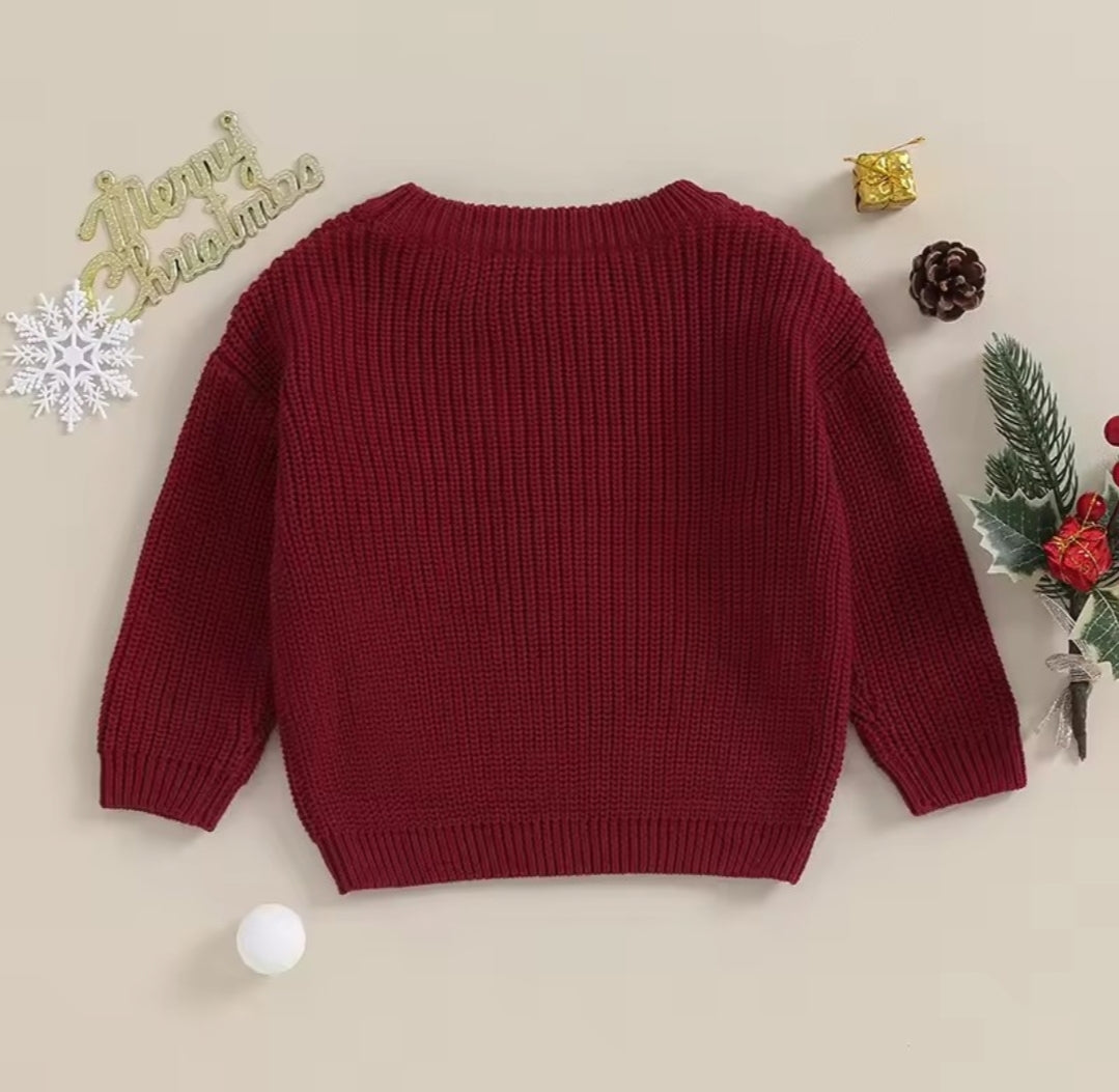 Primer suéter de Navidad